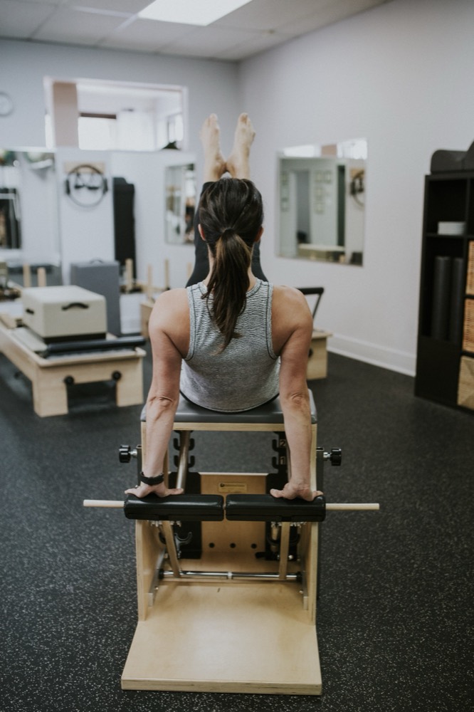 Exercice Pilates privé vu de dos